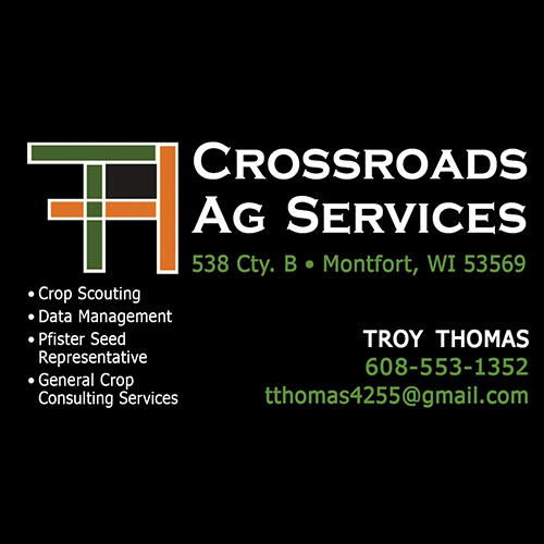 Black business card featuring the Crossroads Ag Services logo, service list, contact information, and location details.